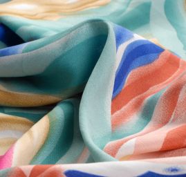 Viskozová šatová látka motiv tahy štětcem tyrkys