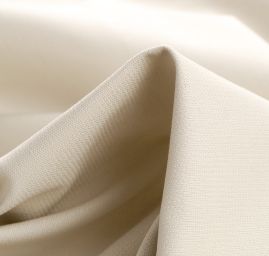 Bavlněná pevnější látka béžovošedé barvy